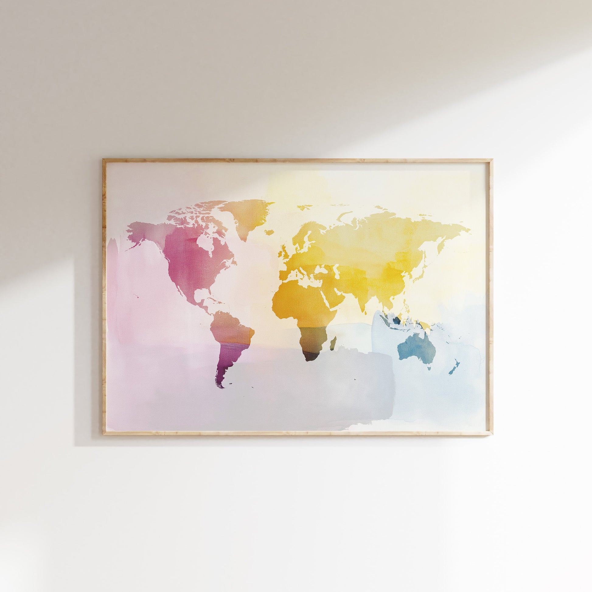 Framed world map art print on a white wall