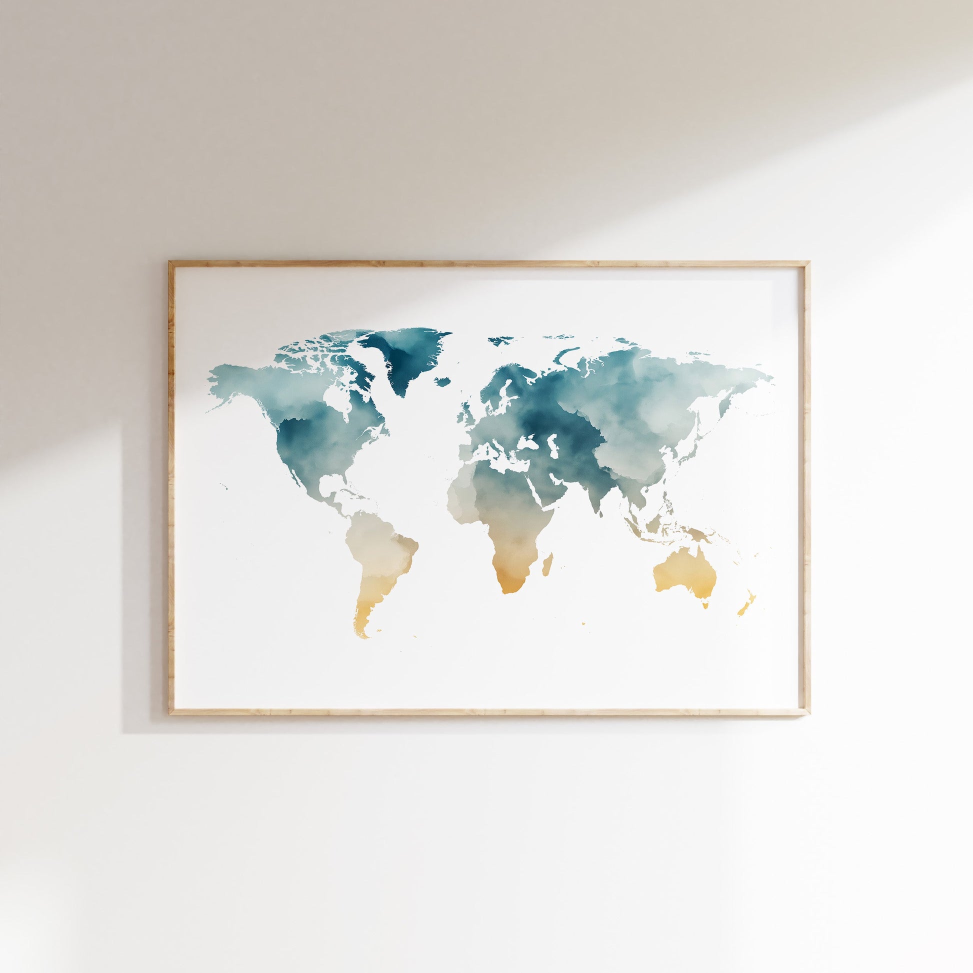 Framed world map art print on a white wall