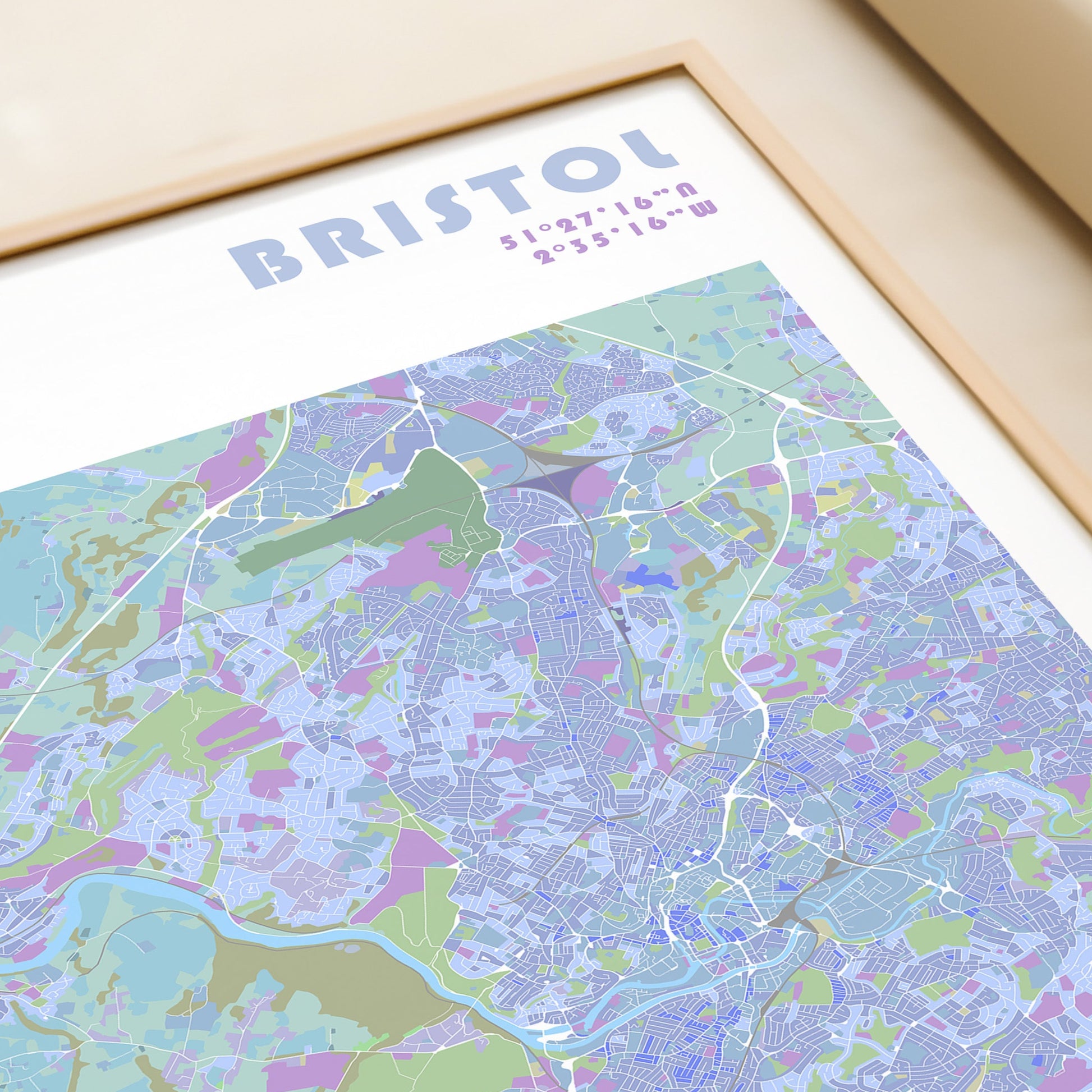 Bristol travel map poster in a wood frame.