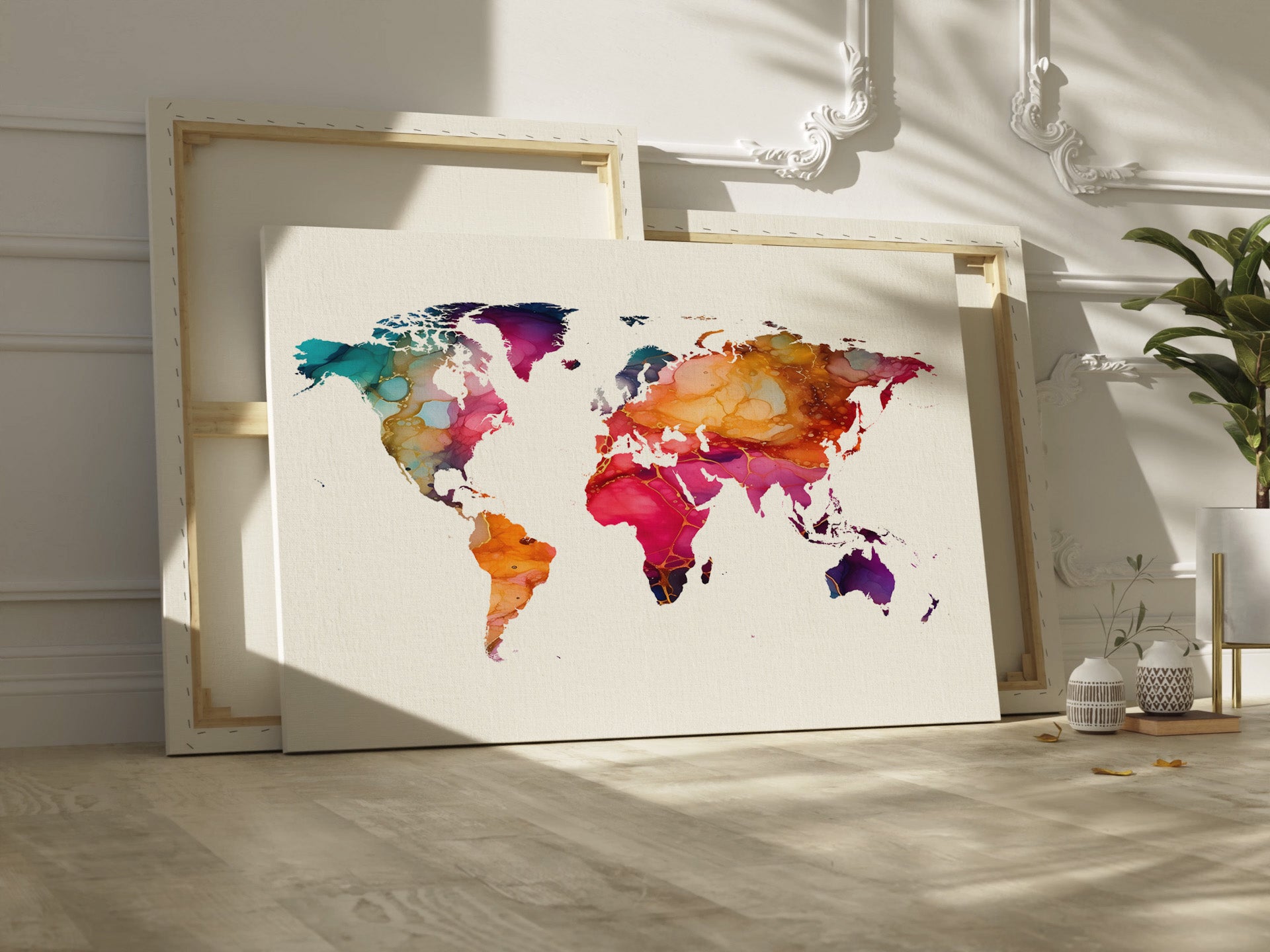 Colorful world map art print on canvas on a light wooden floor.