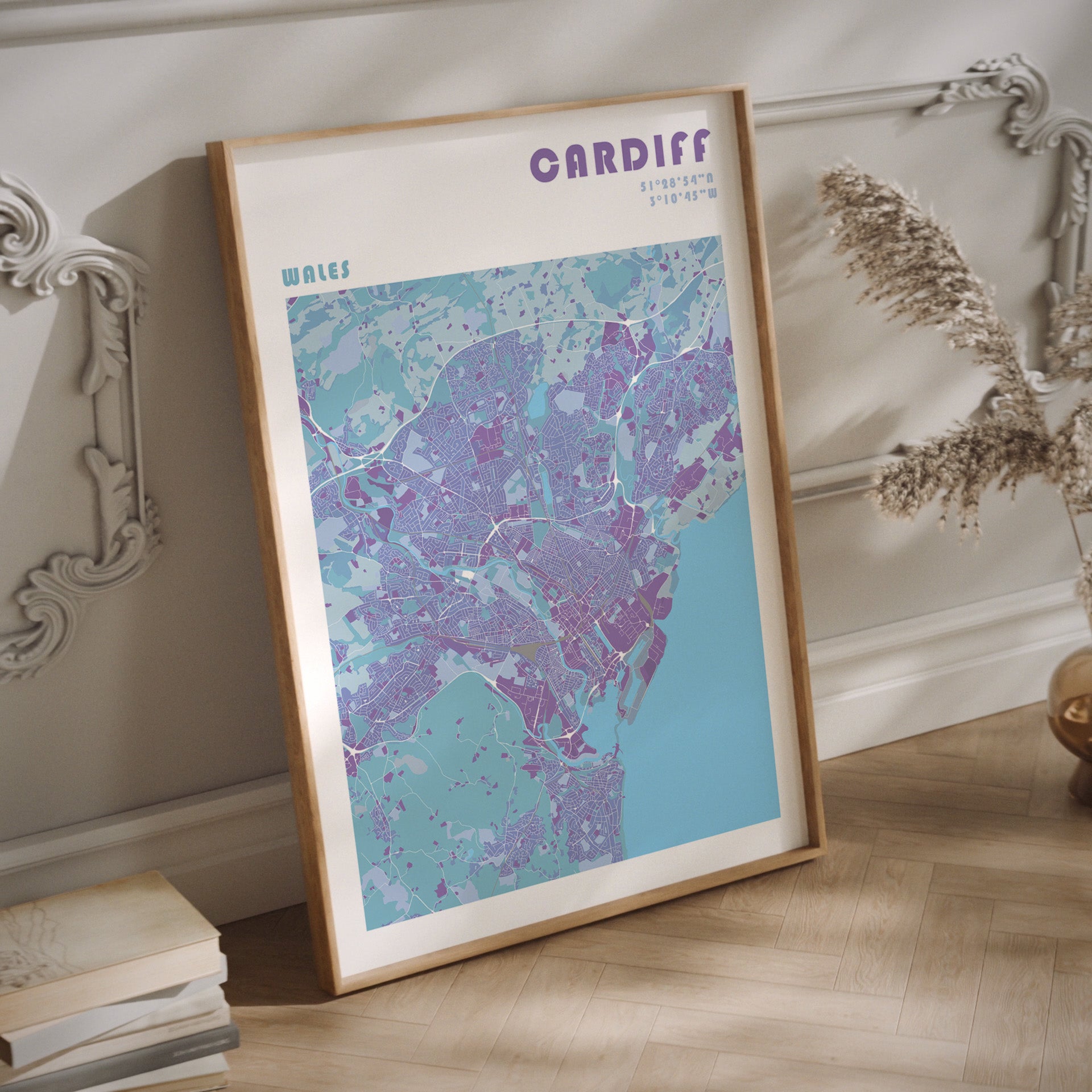 Cardiff travel map print in a natural wood frame.