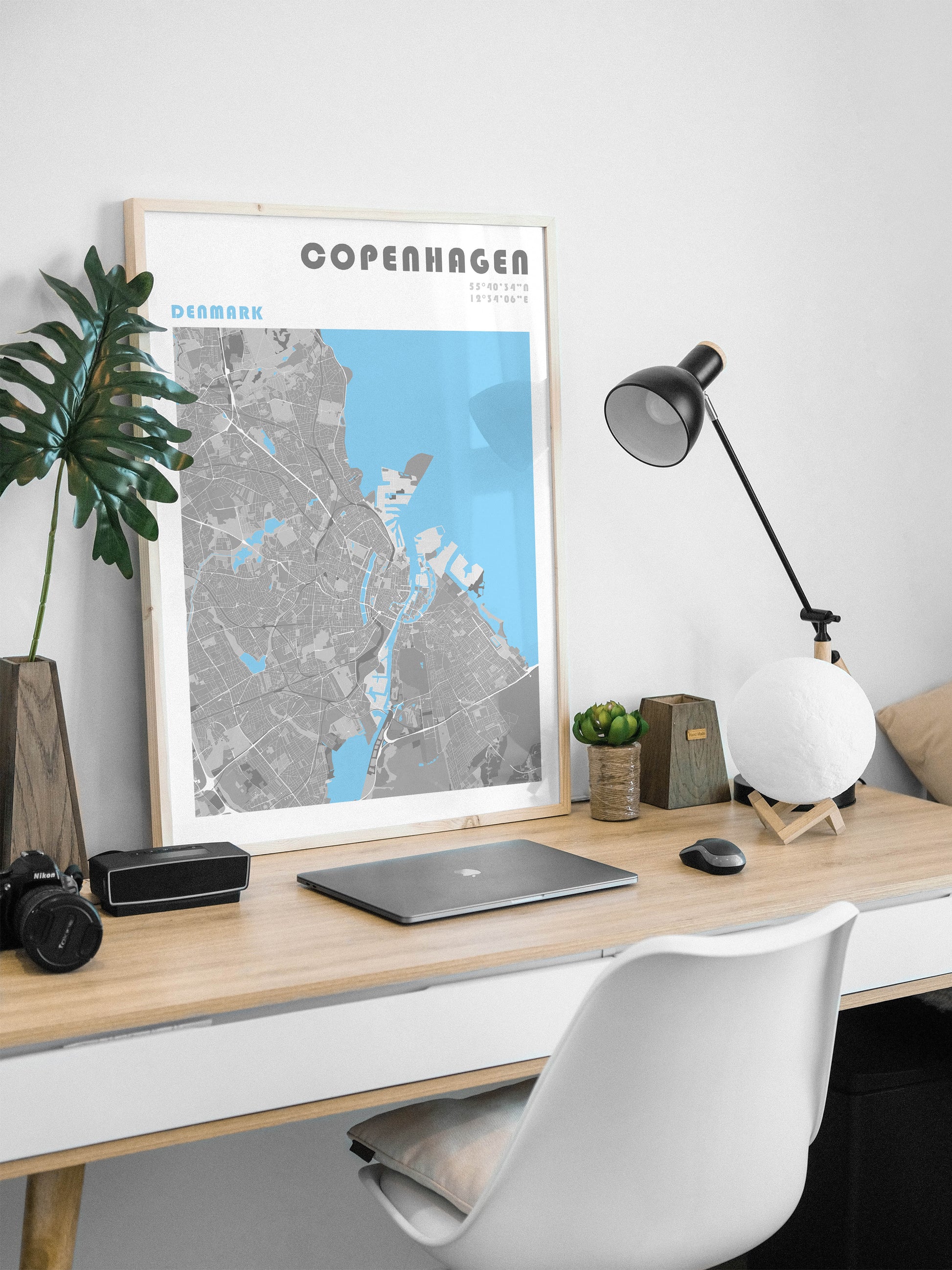 Copenhaguen map poster in a wood frame.