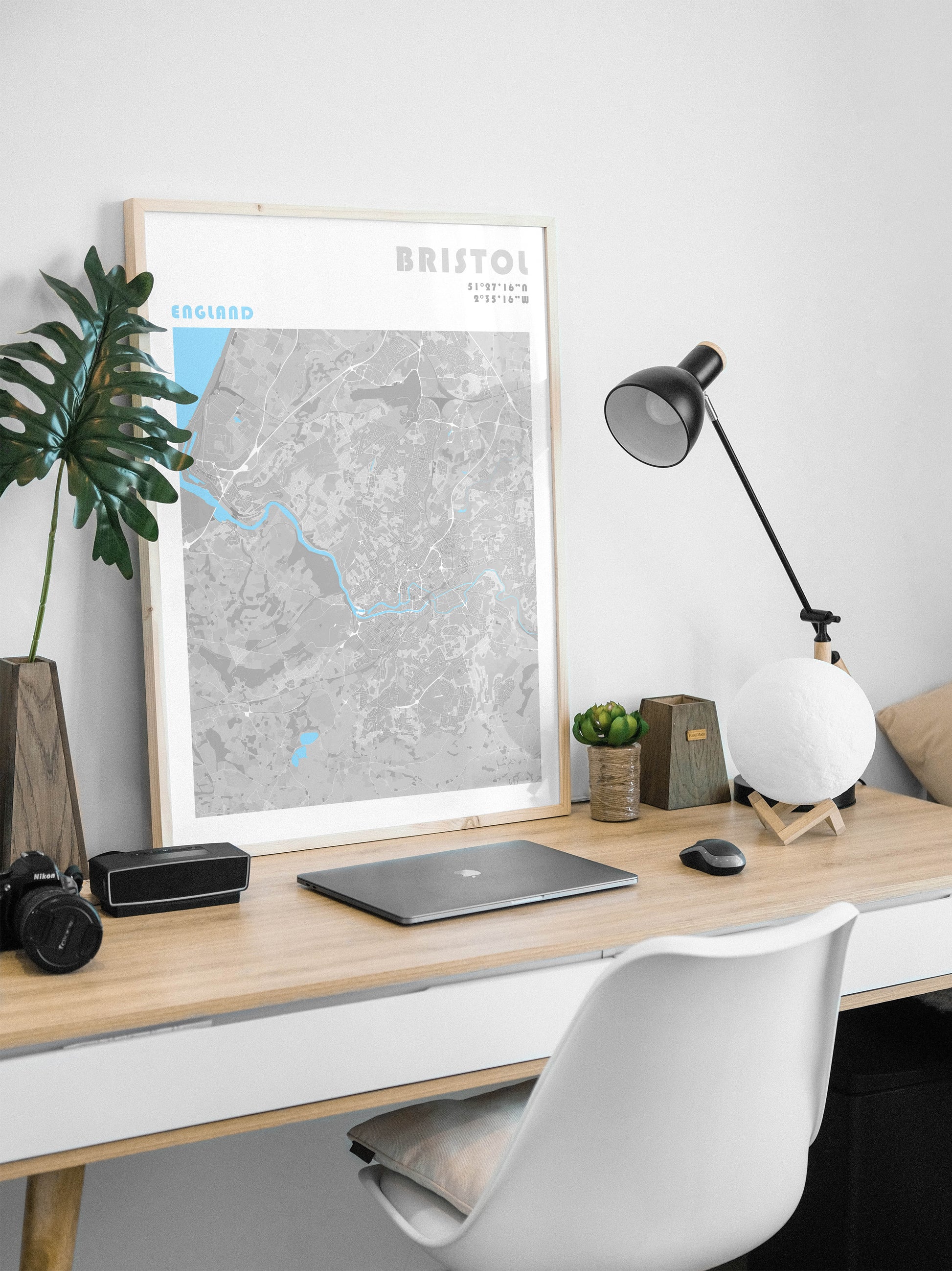 Bristol travel map poster in a natural wood frame.