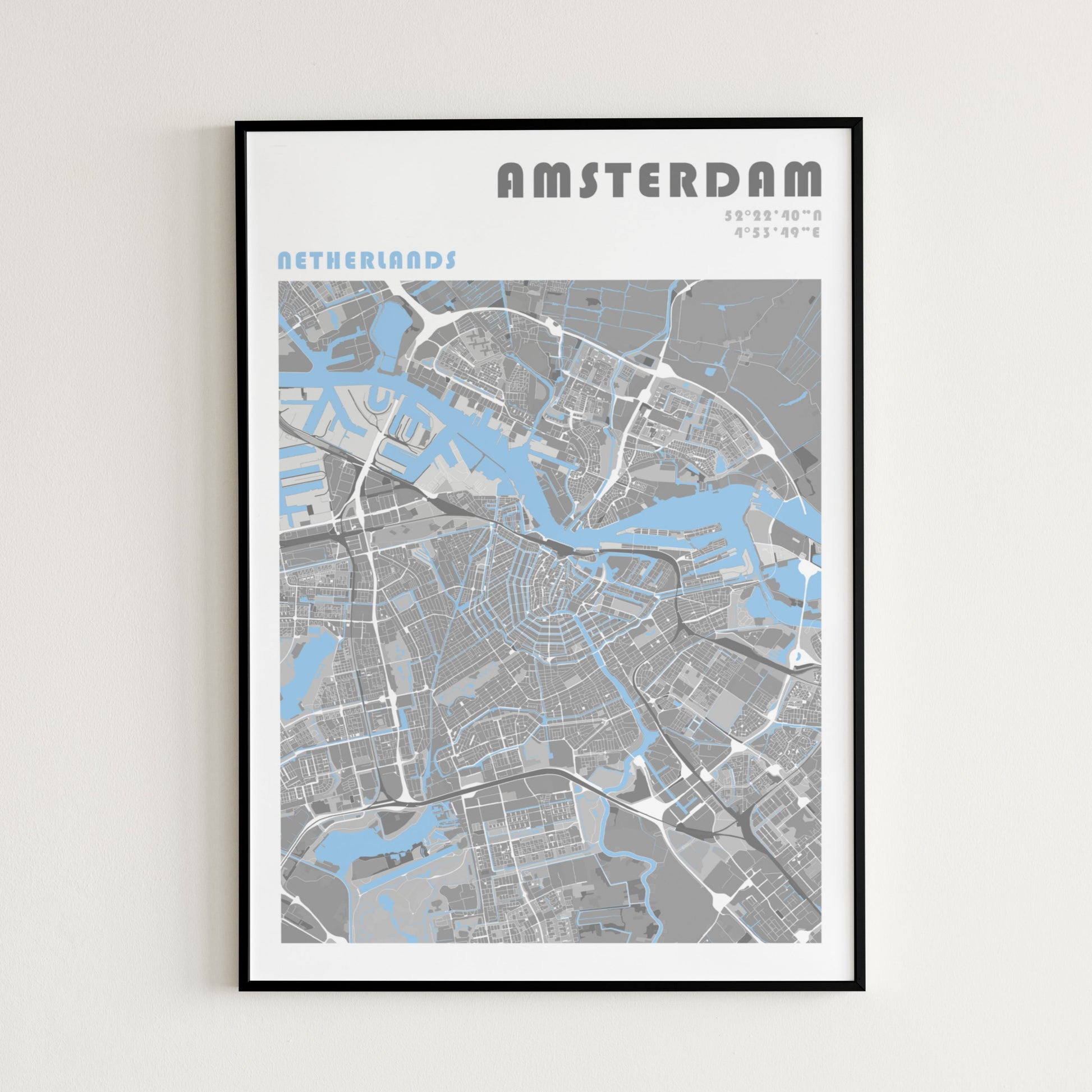 Amsterdam travel map poster in a black metal frame.