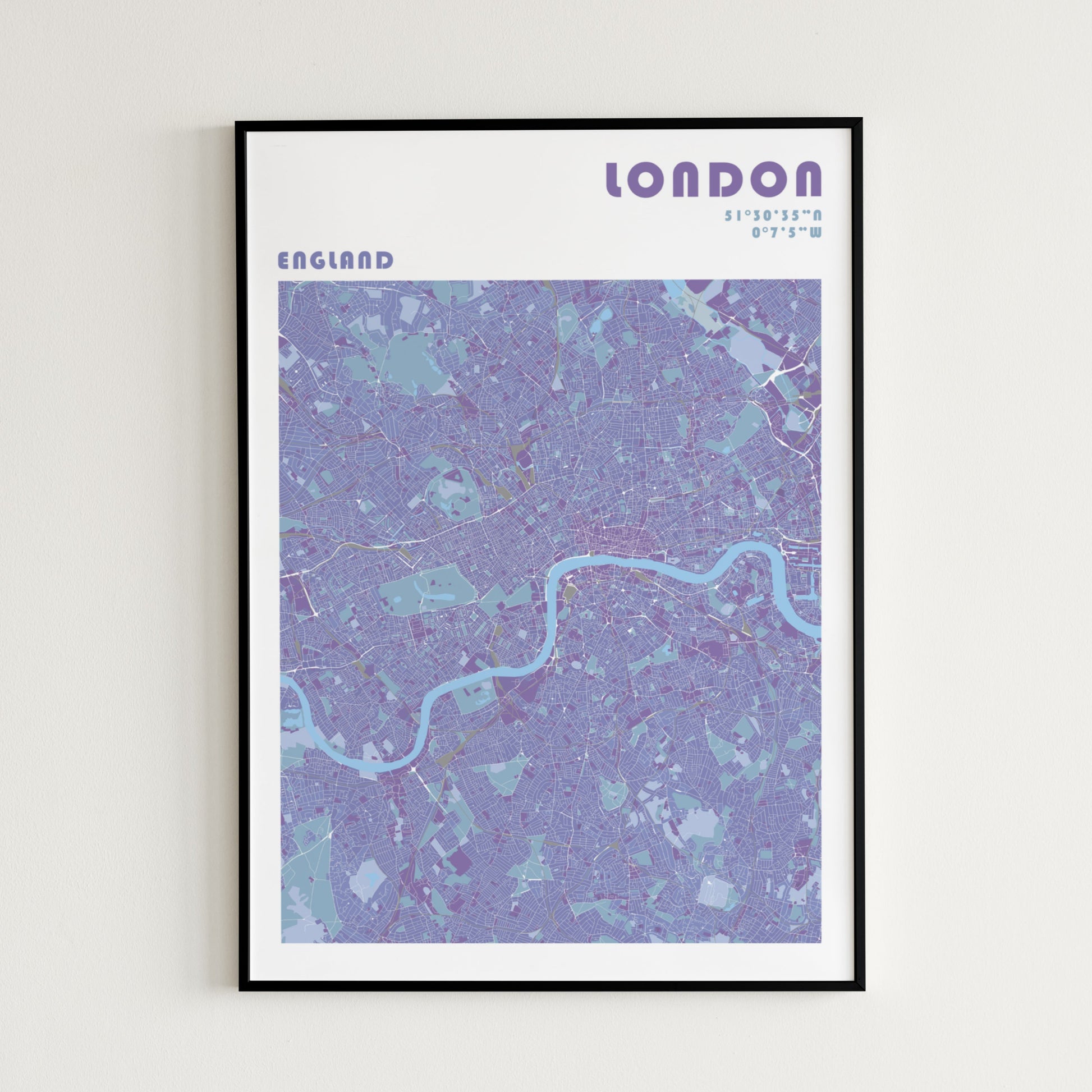 London travel map poster in a black metal frame.