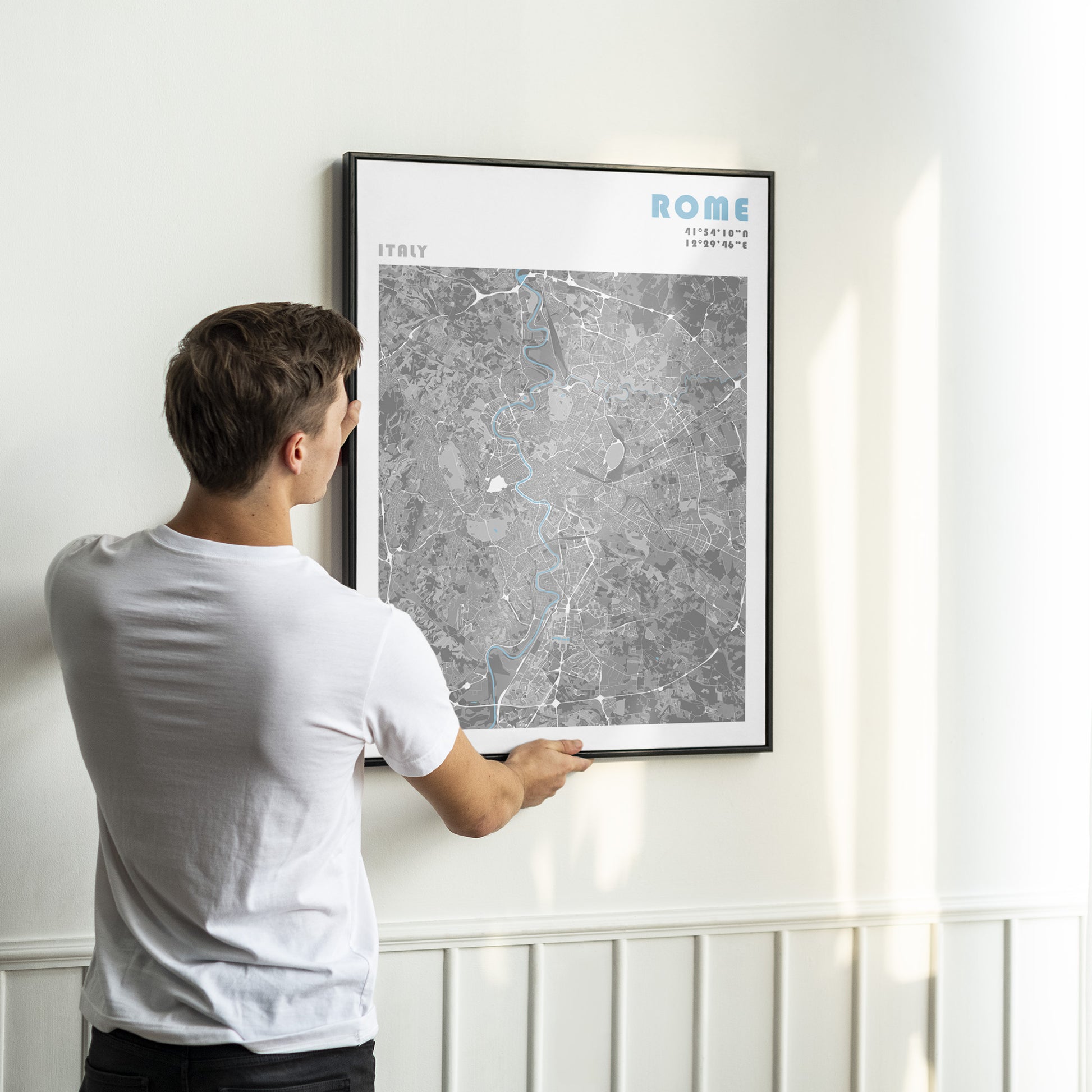 Rome city print in a black frame.