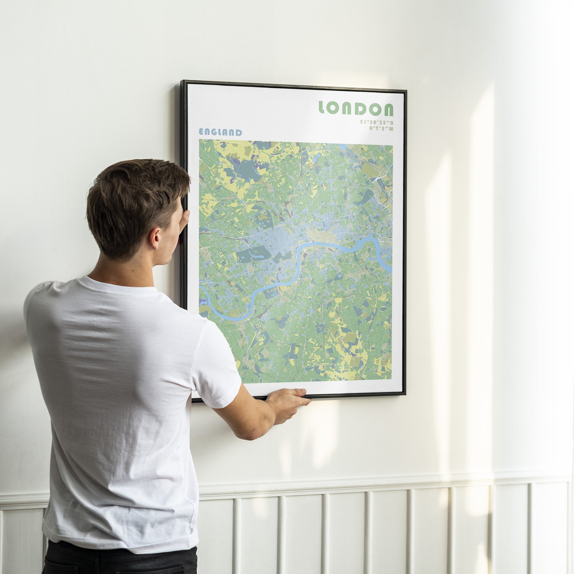 London city map poster in a black frame.