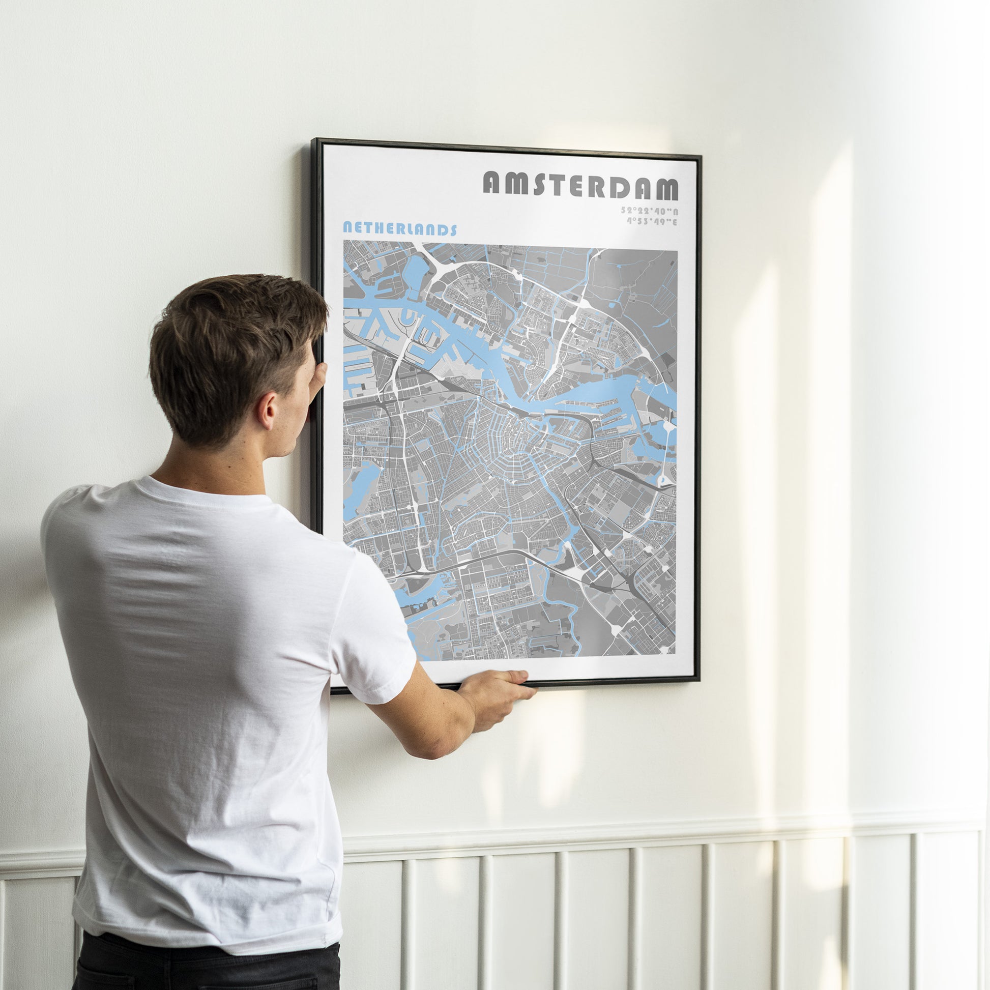 Amsterdam travel map wall art in a metal frame.