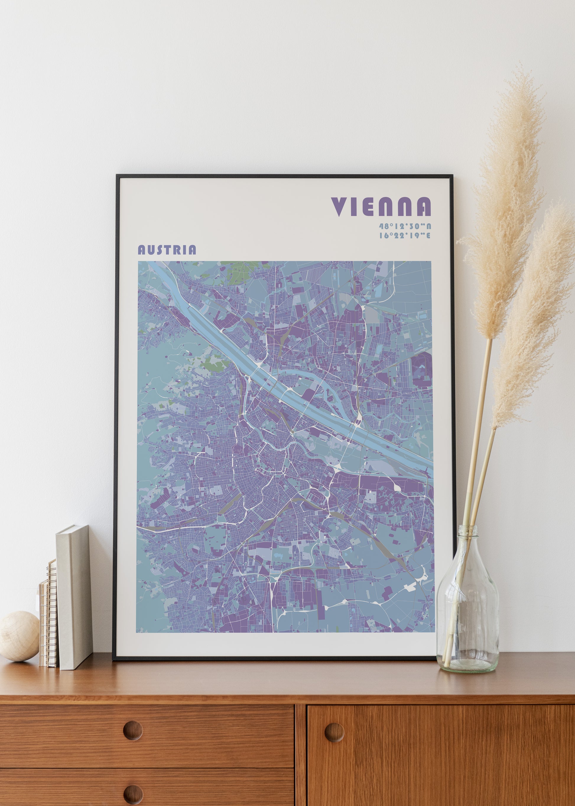 Vienna map print in a black metal frame,
