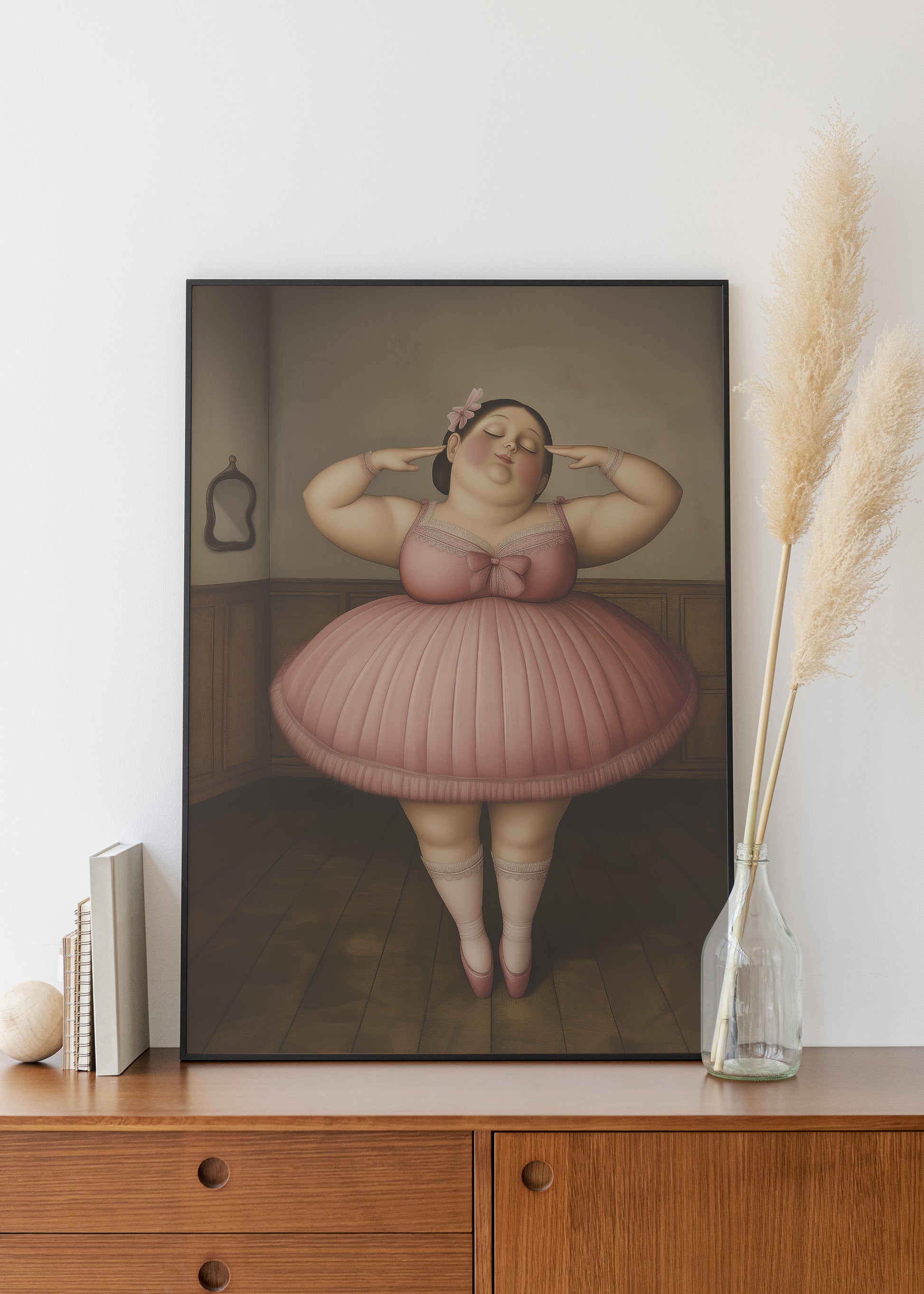 Botero ballerina wall art print in a black metal frame.