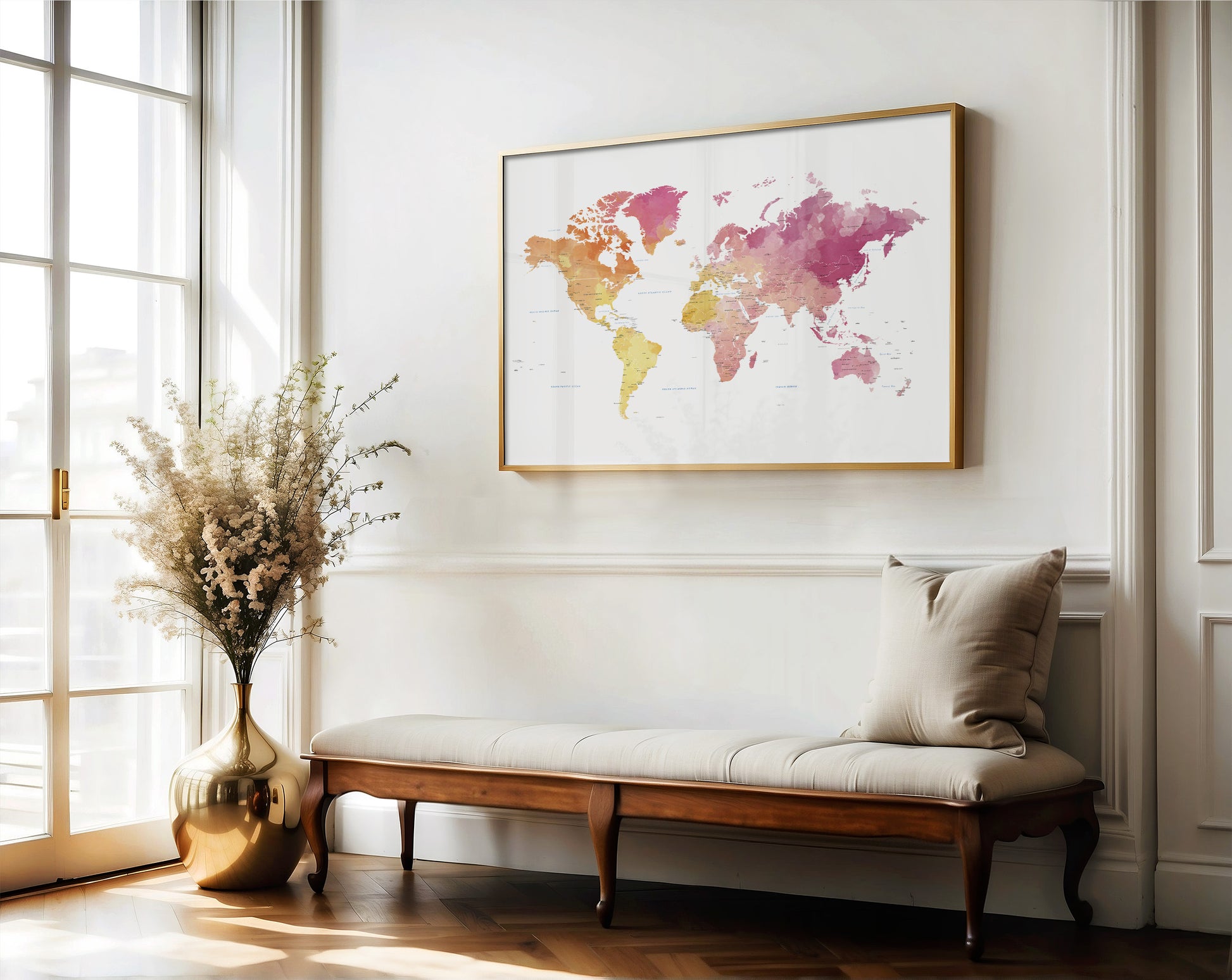 World map poster on a wall above a wooden bench with a vase and plant.