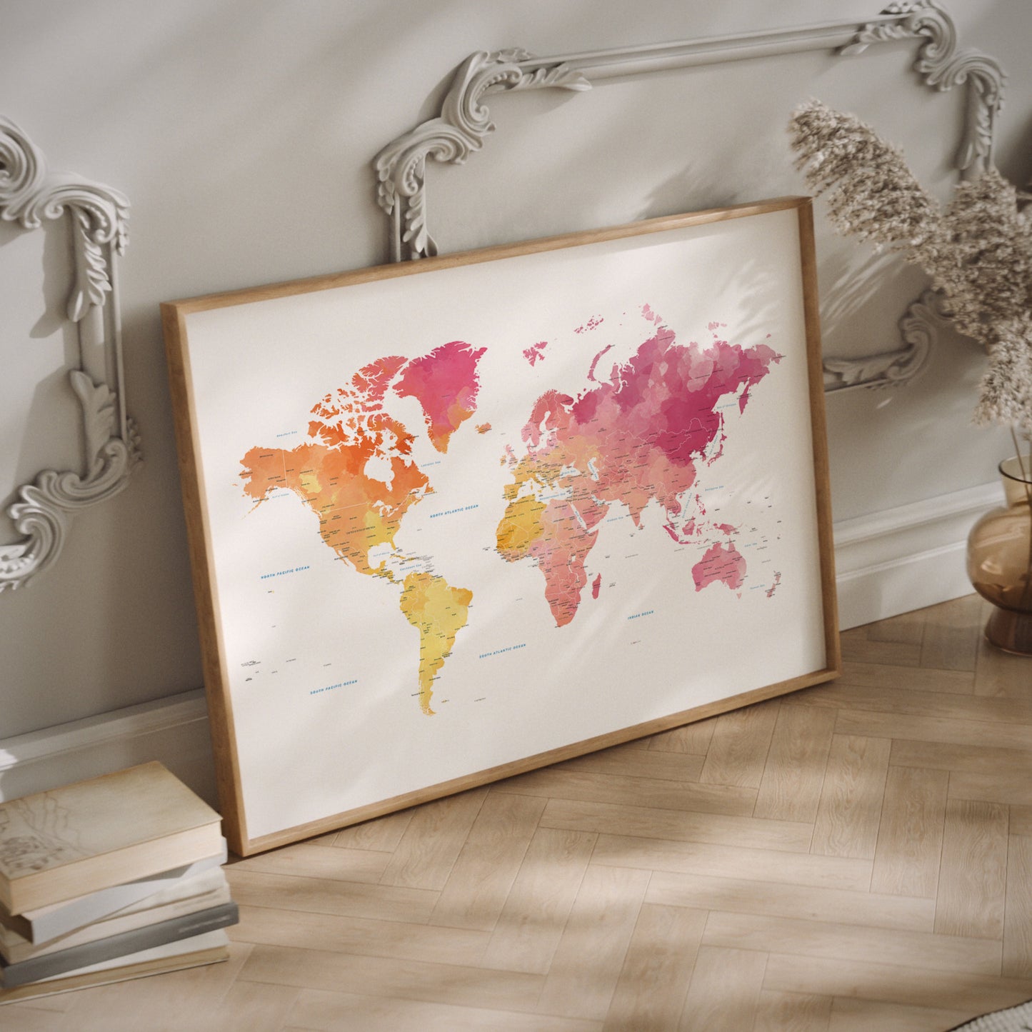 Framed world map with watercolor design on a wall