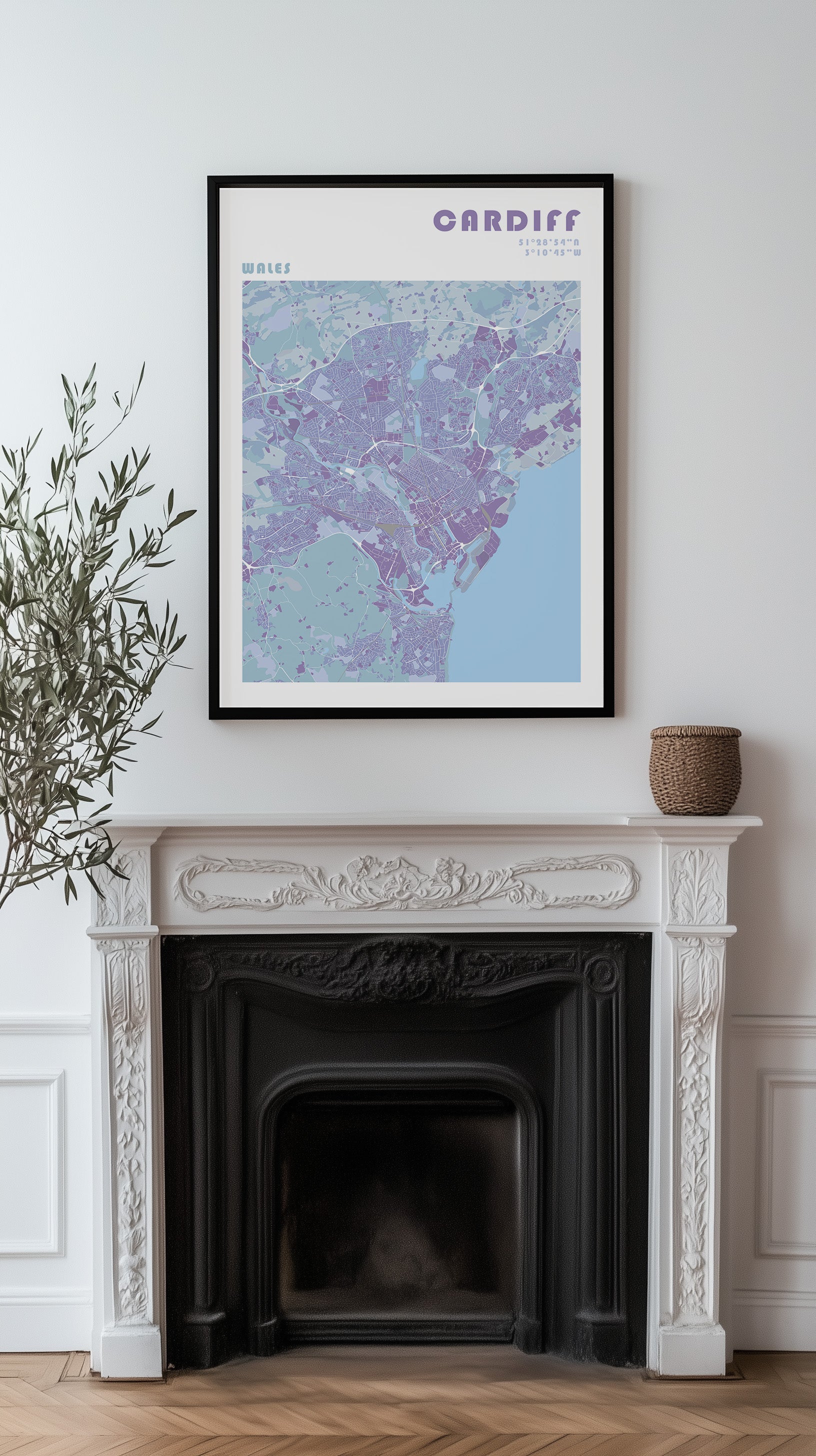 Cardiff travel map poster above a beautiful fireplace.