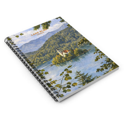 Notebook with a scenic cover featuring a church and trees on a white background