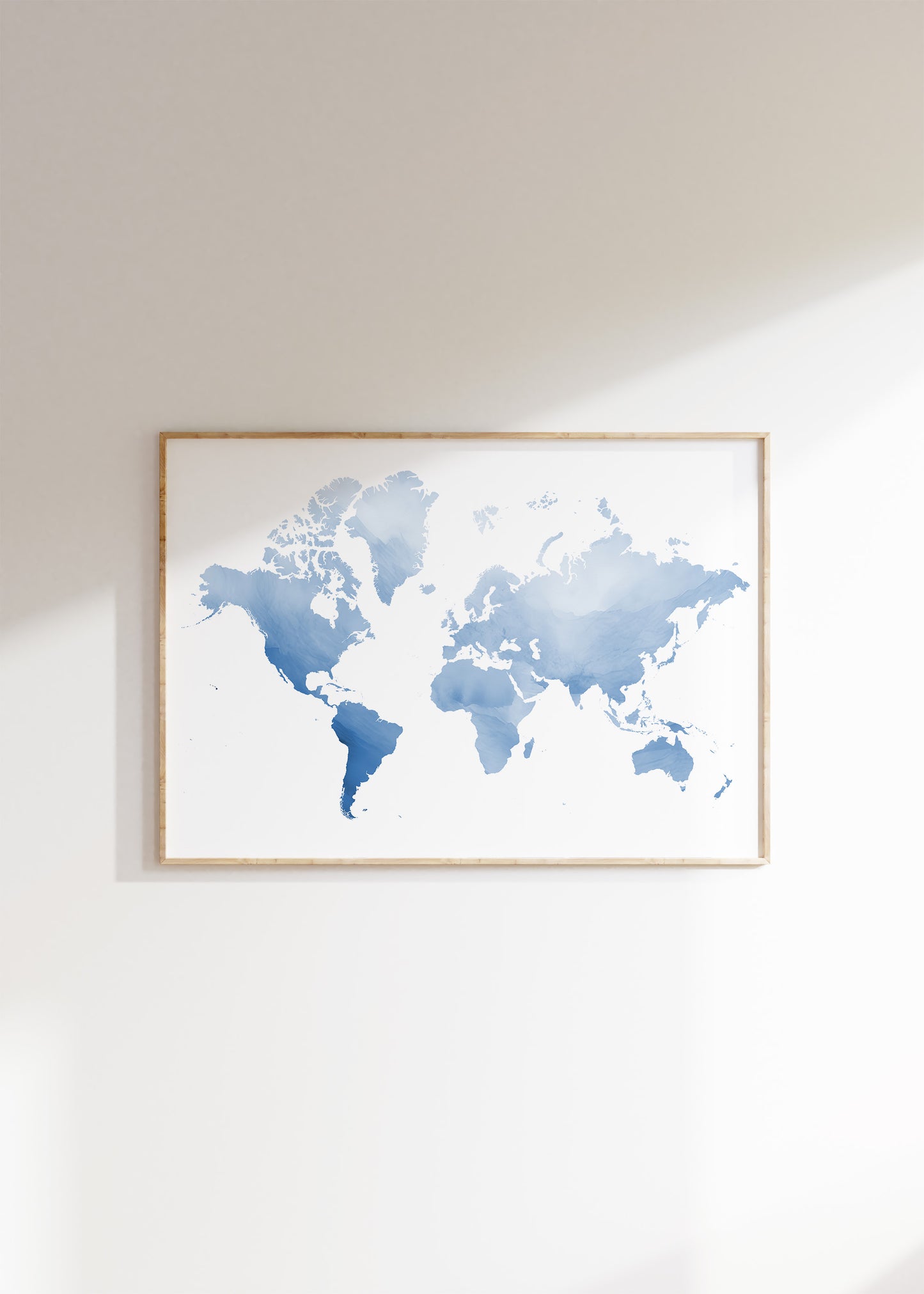 Watercolor blue world map in a wood frame.