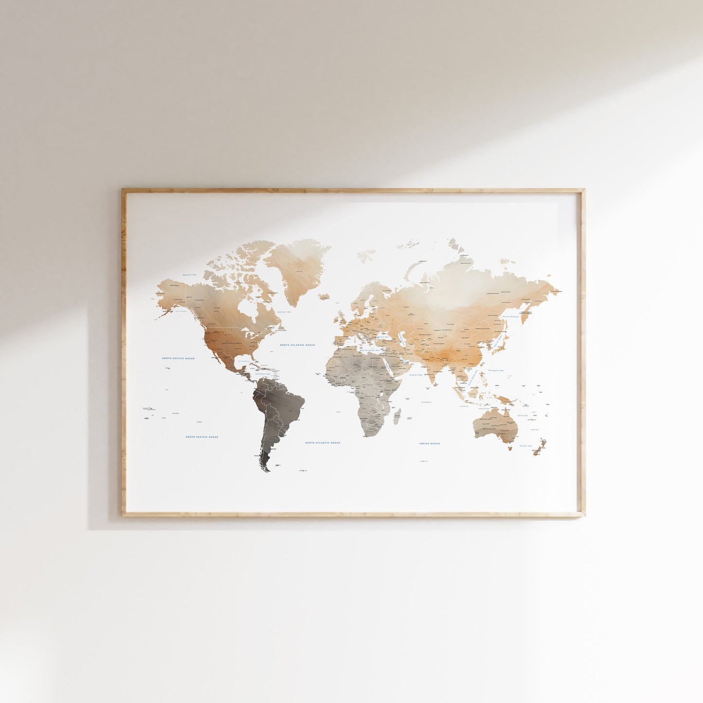 Watercolor world map in Earth tones.