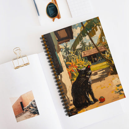Notebook with a black cat illustration on a white surface