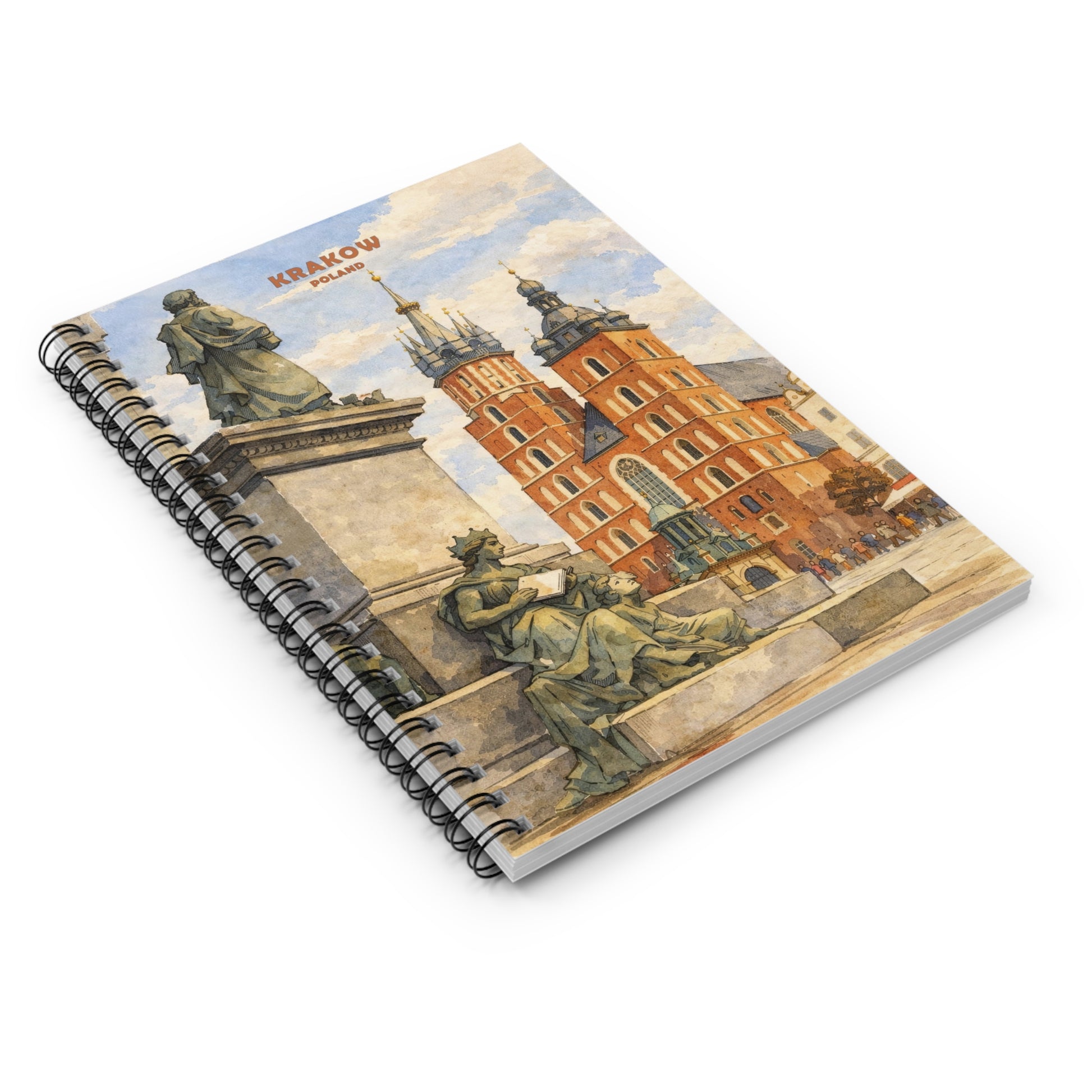 Notebook with a scenic cover featuring statues and buildings, titled 'Krakow'.