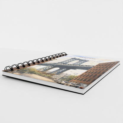 Notebook with a scenic cover on a white background