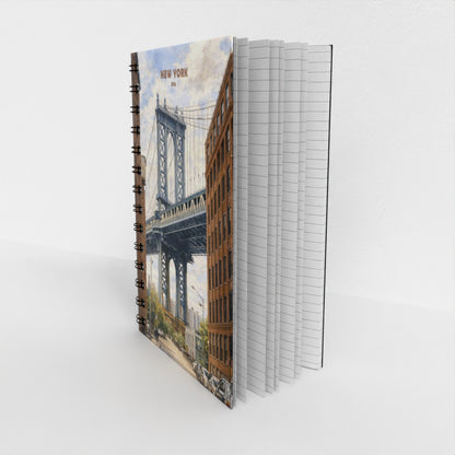 Notebook with a cover featuring the New York City skyline on a white background