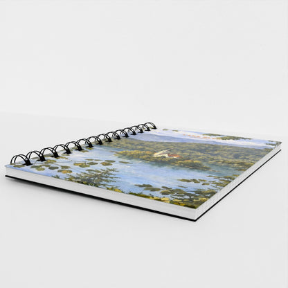 Notebook with a scenic cover of the Lake Bled in slovenia on a white background