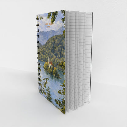 Notebook with a scenic cover featuring a lake and mountains on a white background