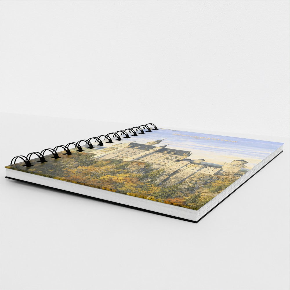 Notebook with a castle design on the cover on a white background