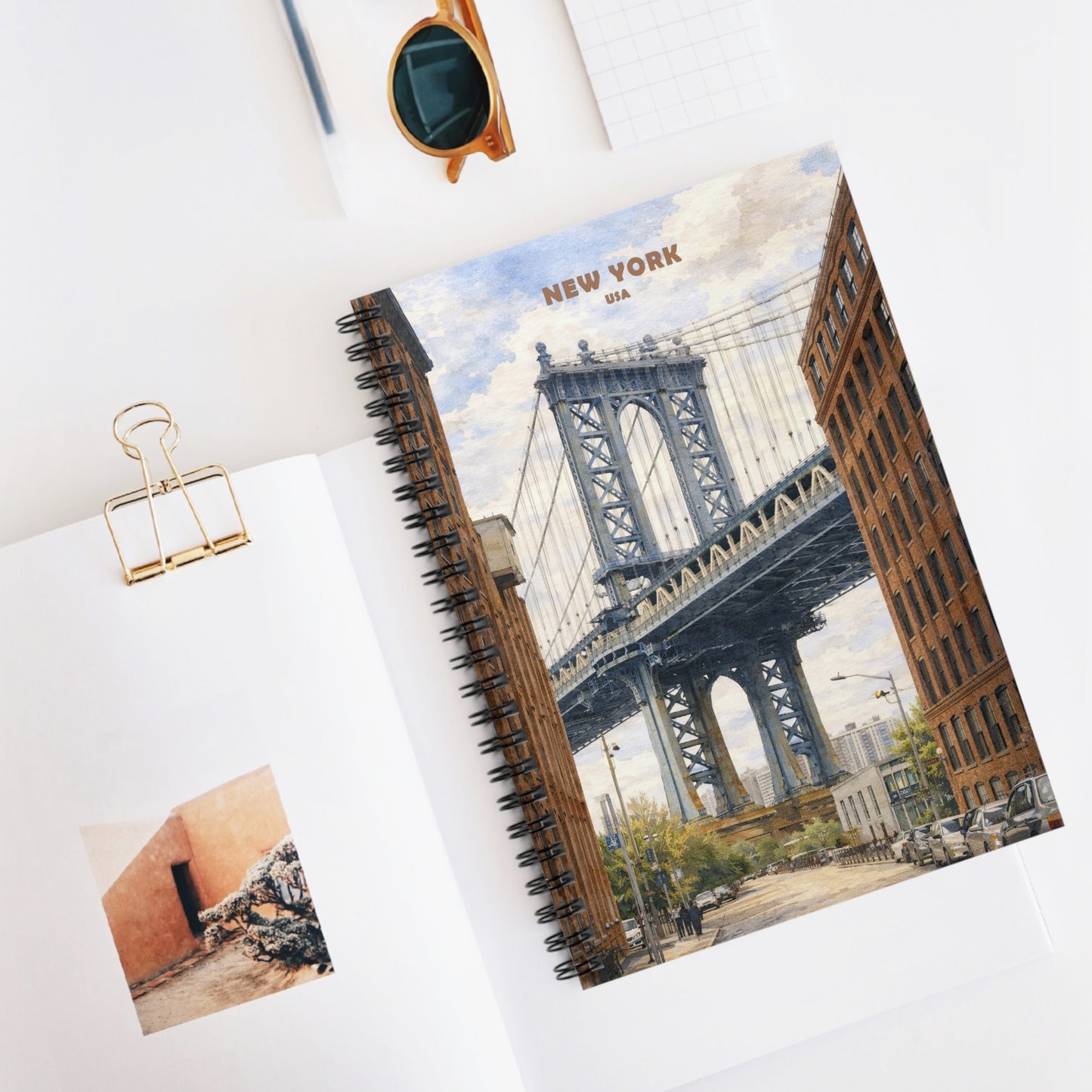 Notebook with a New York City design on a white surface