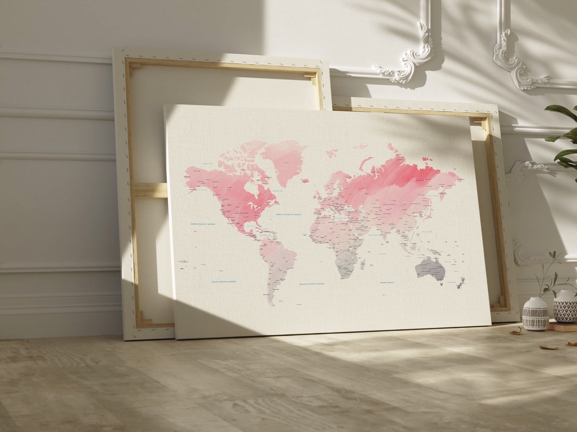 Pink watercolor world map canvas wall art.