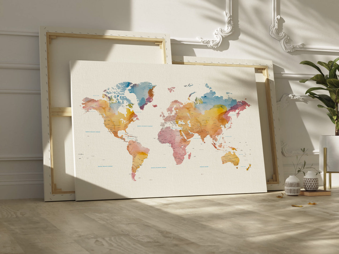 Minimalist world map canvas wall art in beautiful watercolors.