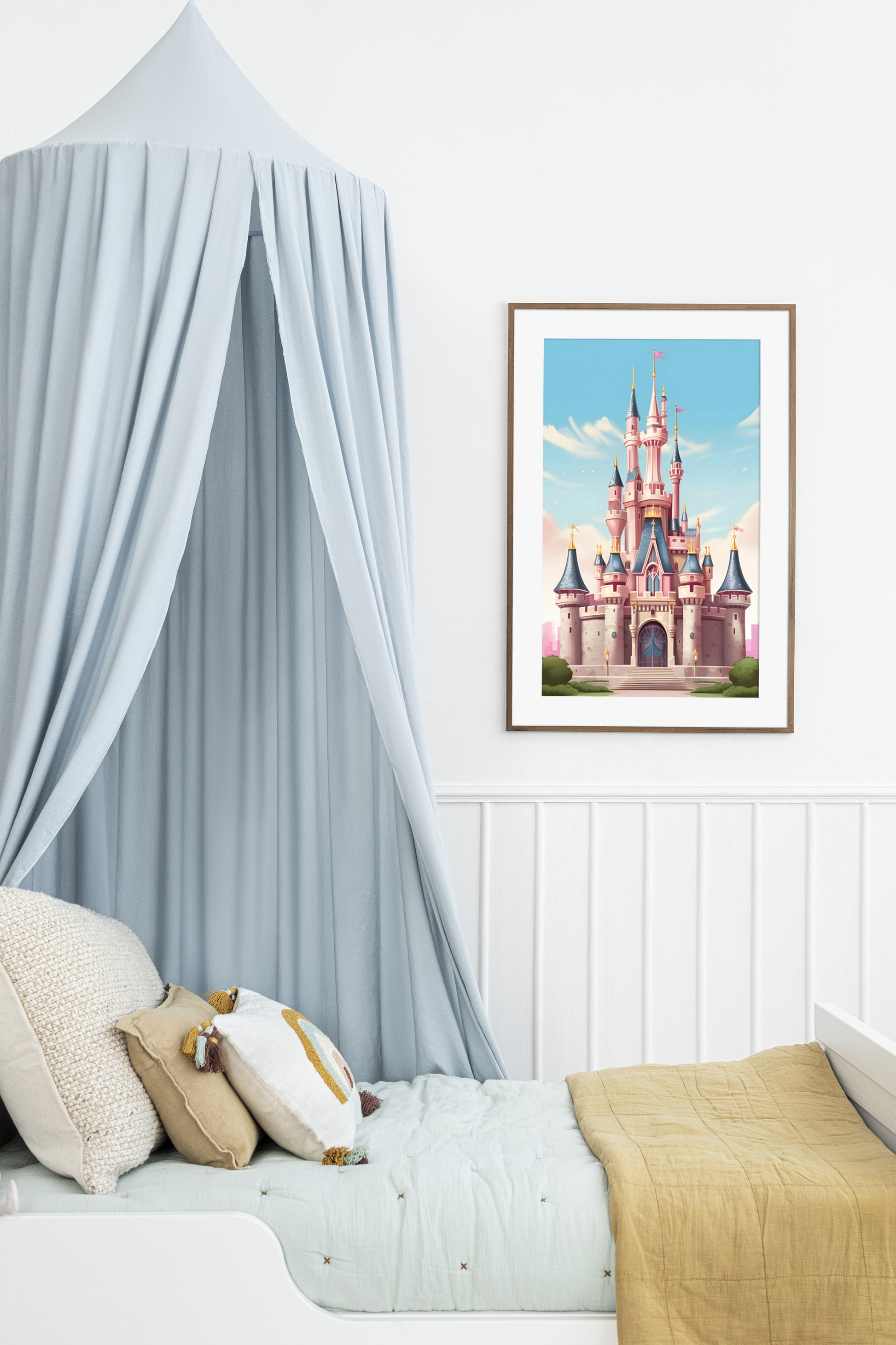 Magic kingdom castle print on a nursery wall.