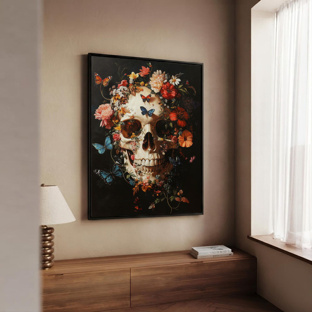 A framed wall art print featuring a detailed skull surrounded by colorful flowers and butterflies, displayed in a real interior setting above a wooden console table.