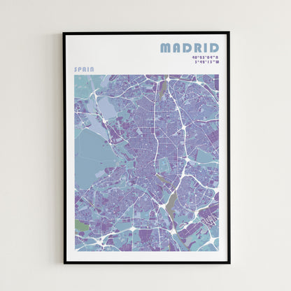 Madrid travel map poster in a black metal frame.