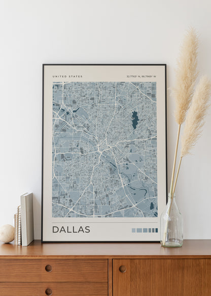 A blue Dallas city map print in a black metal frame