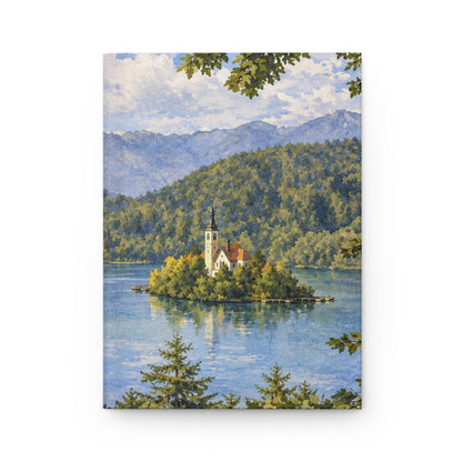 A vertical art print or poster featuring a scenic landscape painting of a small white church on an island in a blue lake, surrounded by green forested hills and mountains under a cloudy sky.