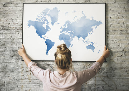 Watercolor blue world map wall art.