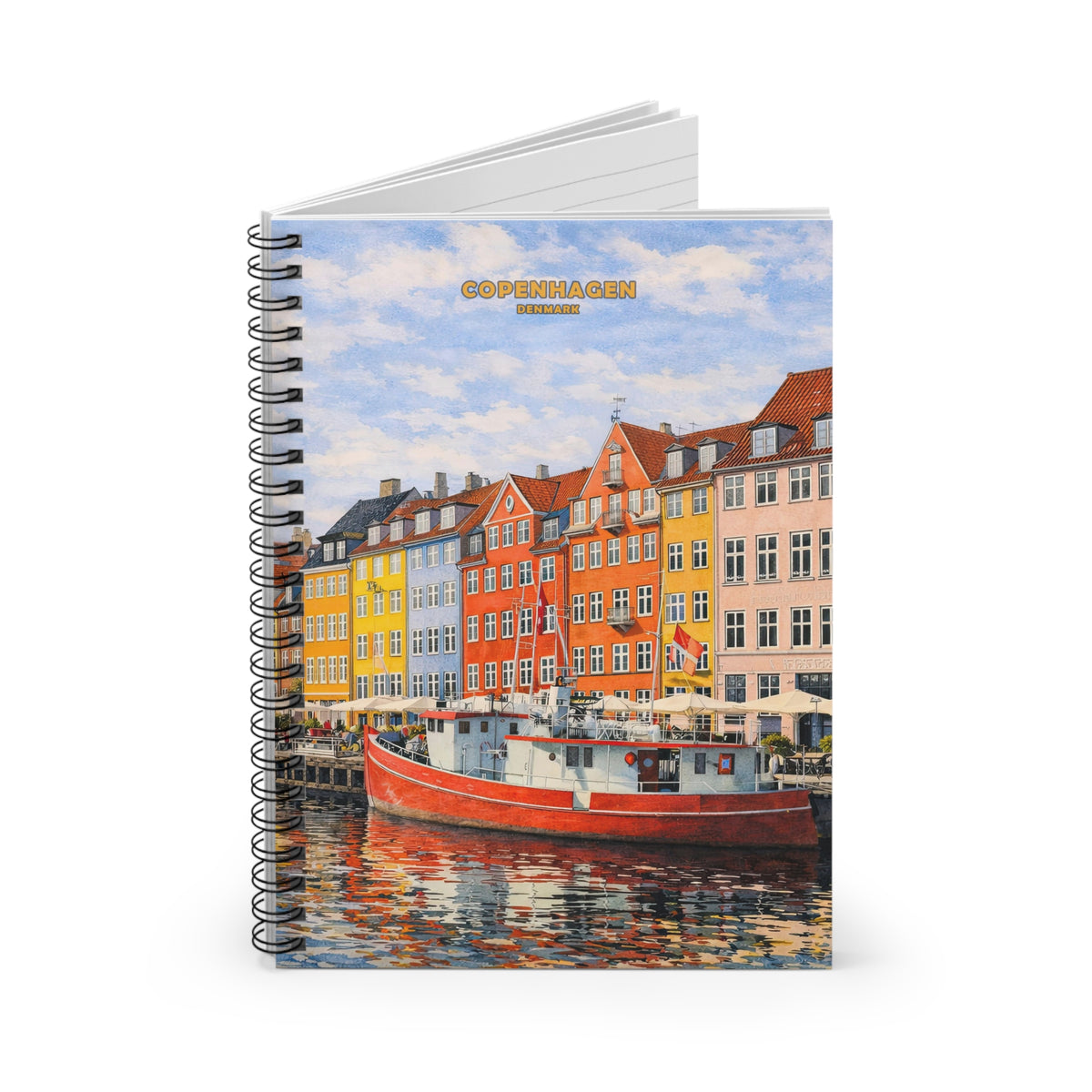 A spiral-bound notebook featuring a colorful printed cover illustration of Copenhagen waterfront buildings and a red boat, shown on a clean white background.
