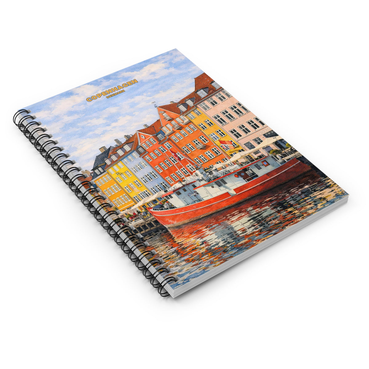 A spiral-bound notebook featuring a colorful painting of Nyhavn, Copenhagen, with yellow and orange buildings and a red boat on the cover, shown on a white background.
