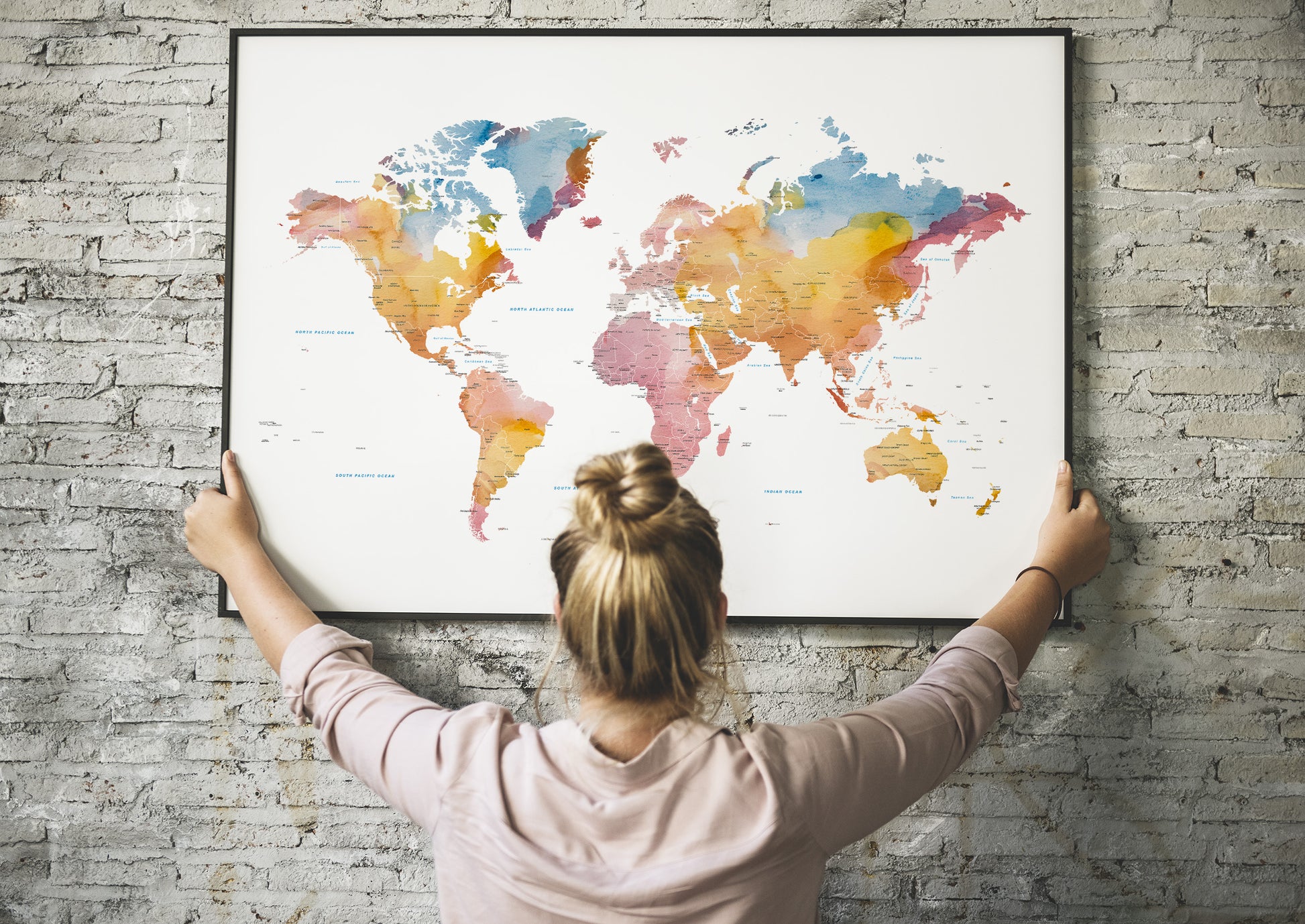 Minimalist world map wall art in beautiful watercolors.