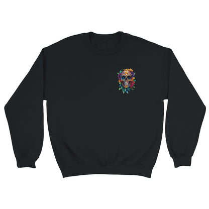 A black crewneck sweatshirt featuring a colorful sugar skull graphic on the left chest, displayed against a solid white background.