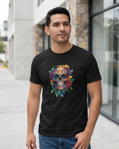 A man wearing a black crewneck t-shirt with a colorful sugar skull graphic, standing outdoors in front of a modern building.