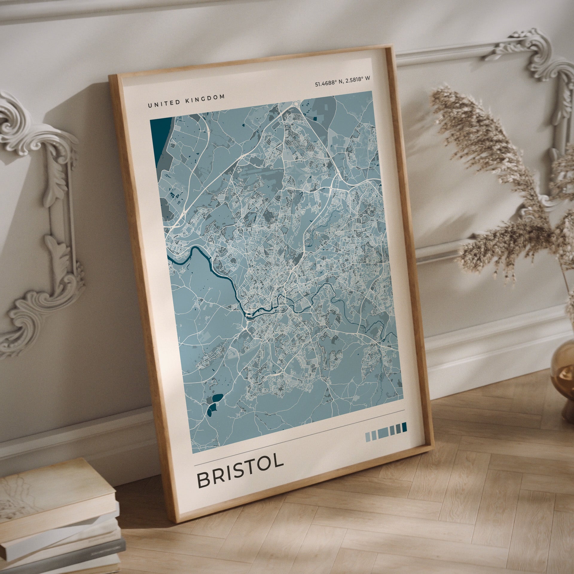 Bristol city map print in blue tones in a wood frame.