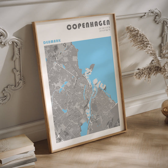 Copenhaguen map poster in a wood frame.