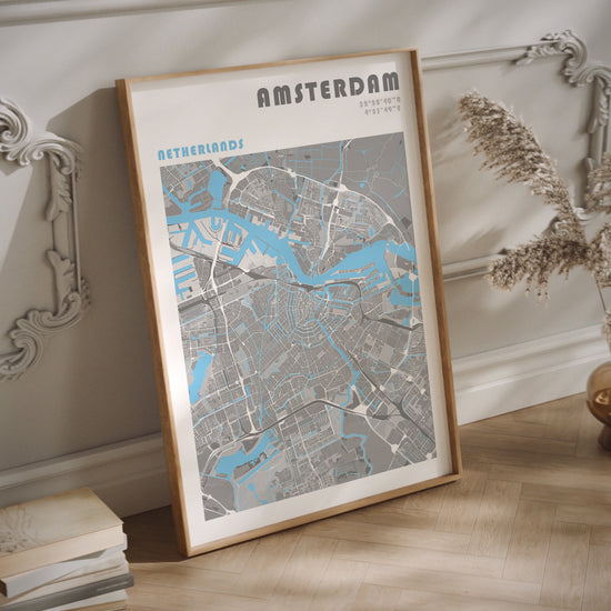 Amsterdam travel map art in a wood frame.