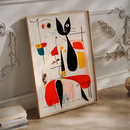 Miro cat wall art in a wood frame