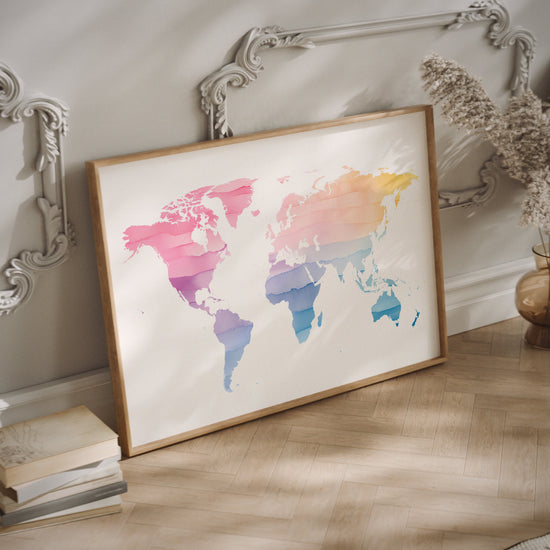 Nursery watercolor world map print in a wood frame