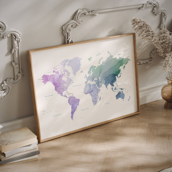A colorful watercolor world map in a wood frame
