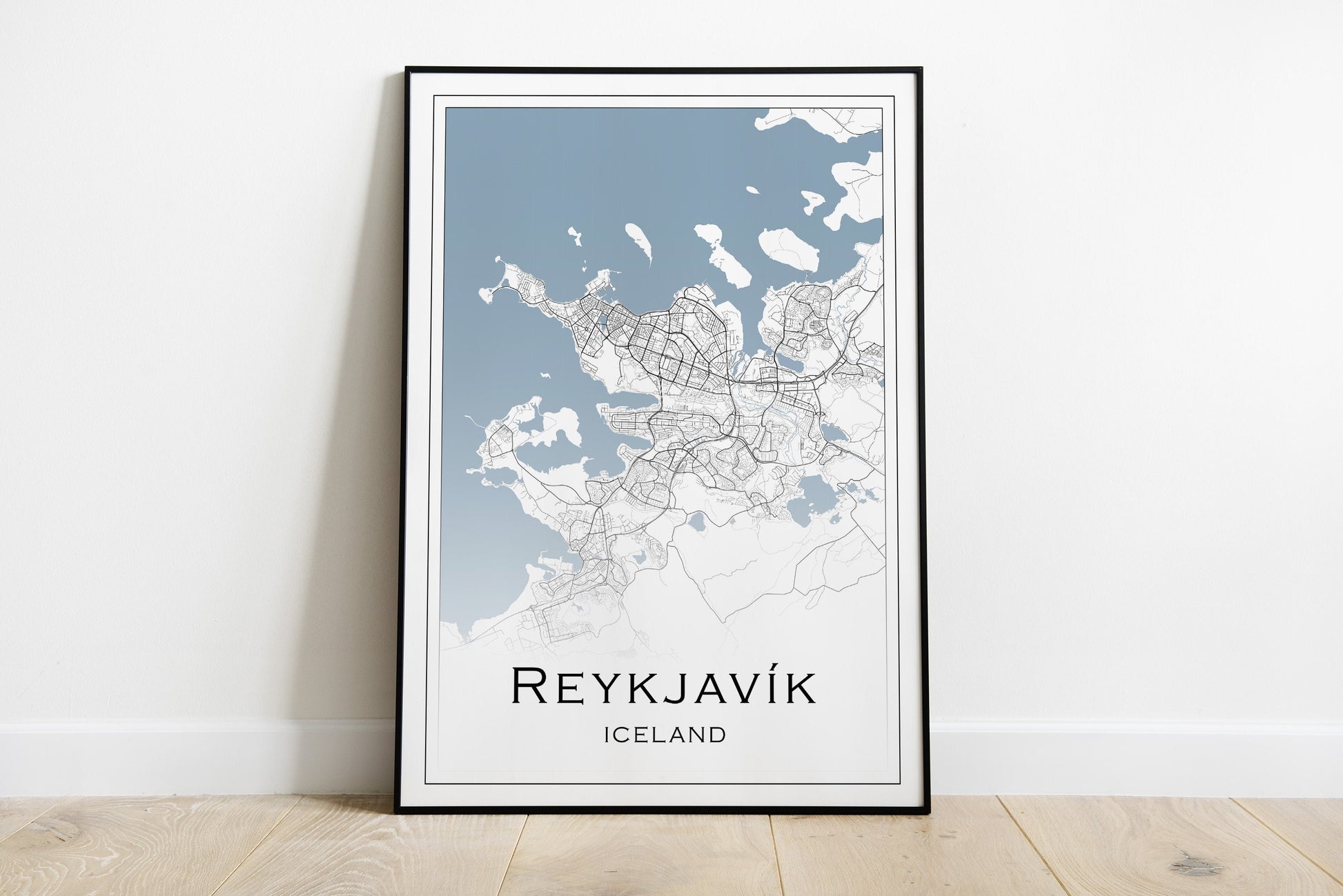 Reykjavik city map print in black and white and blue sea.