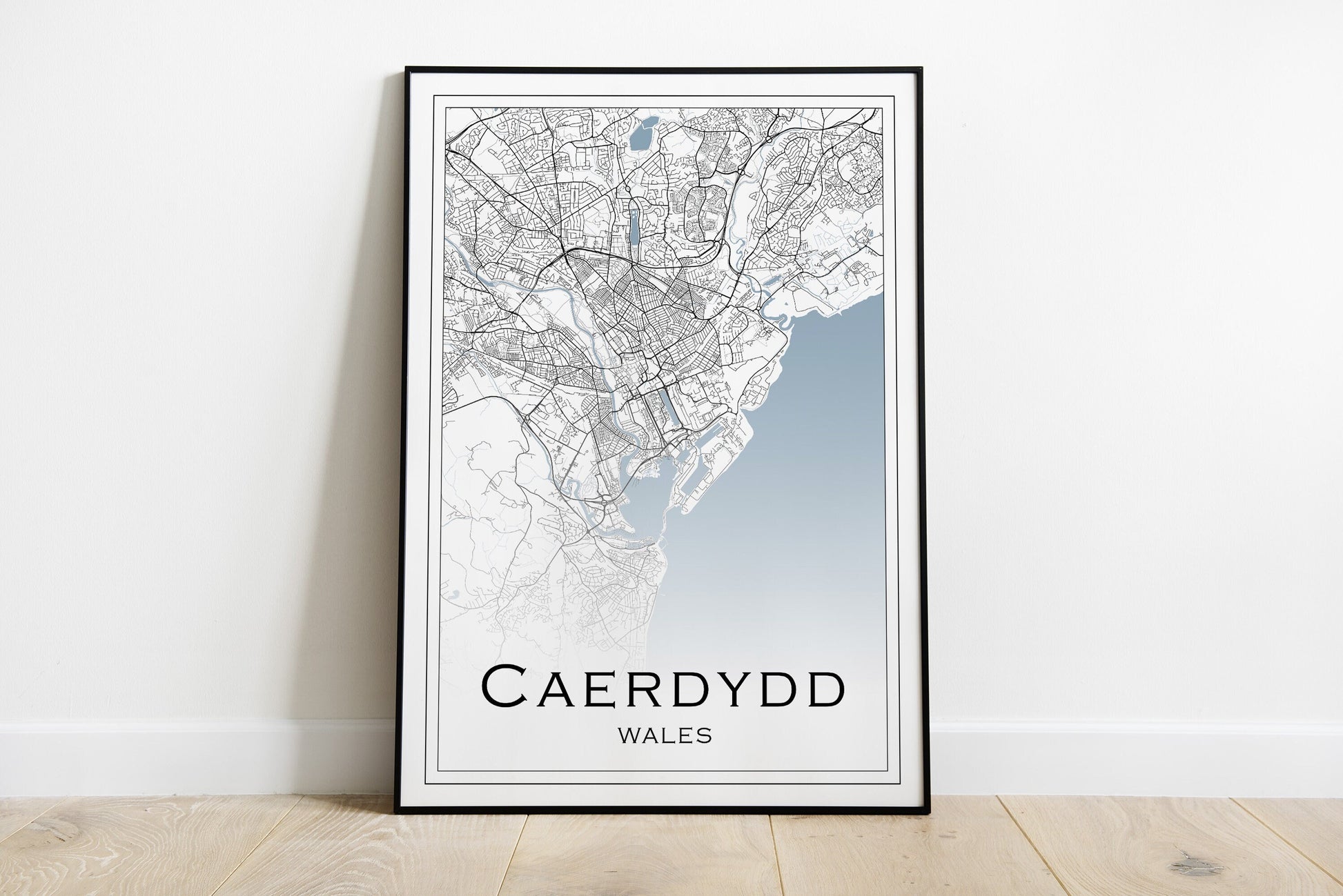 Caerdydd city map print in black and white and blue sea.