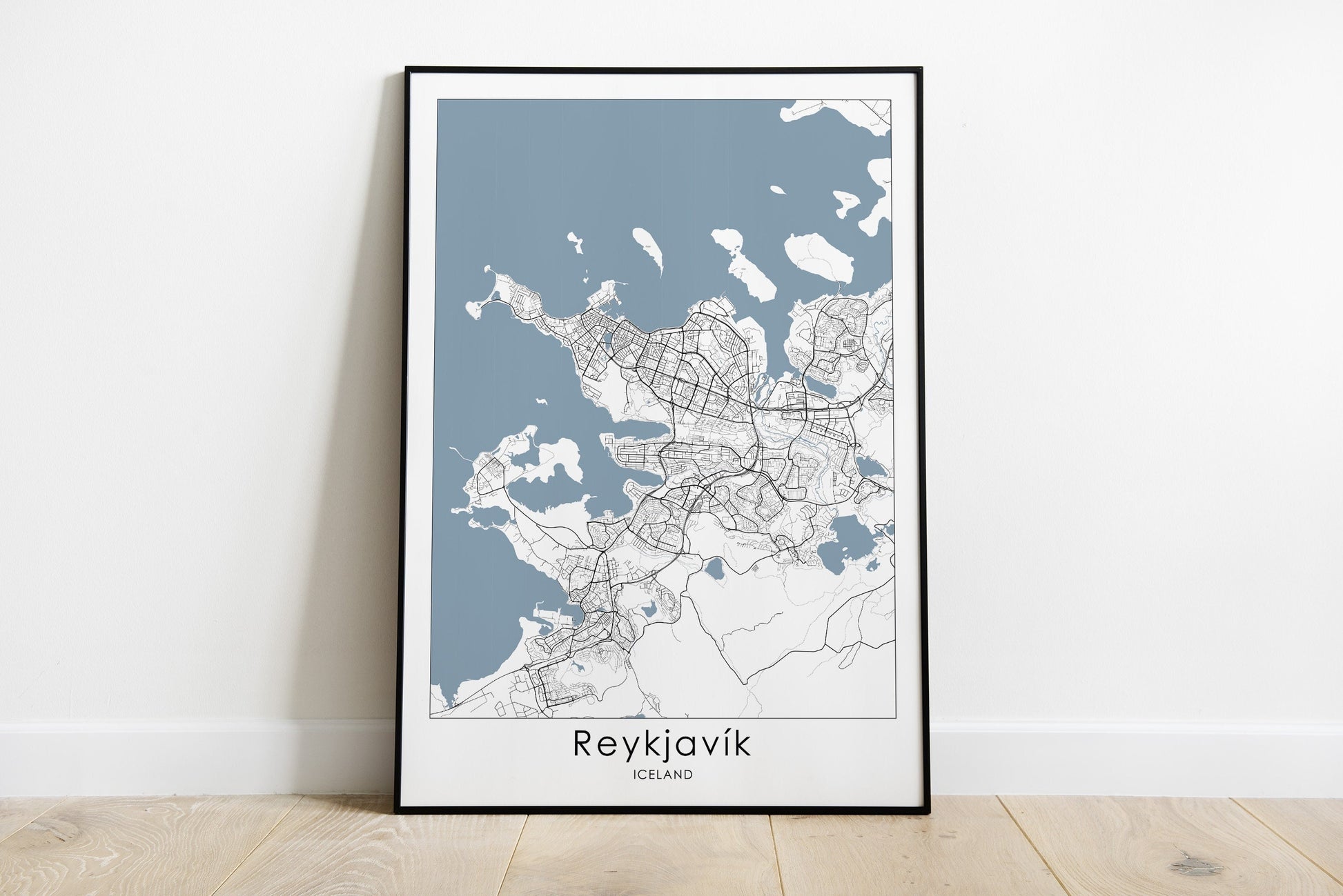 Reykjavik city map print in black and white and blue sea.